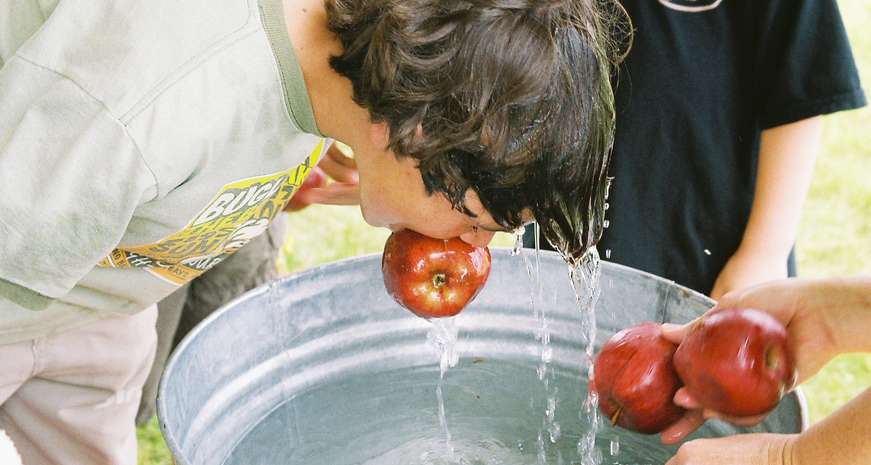 grabbing an apple